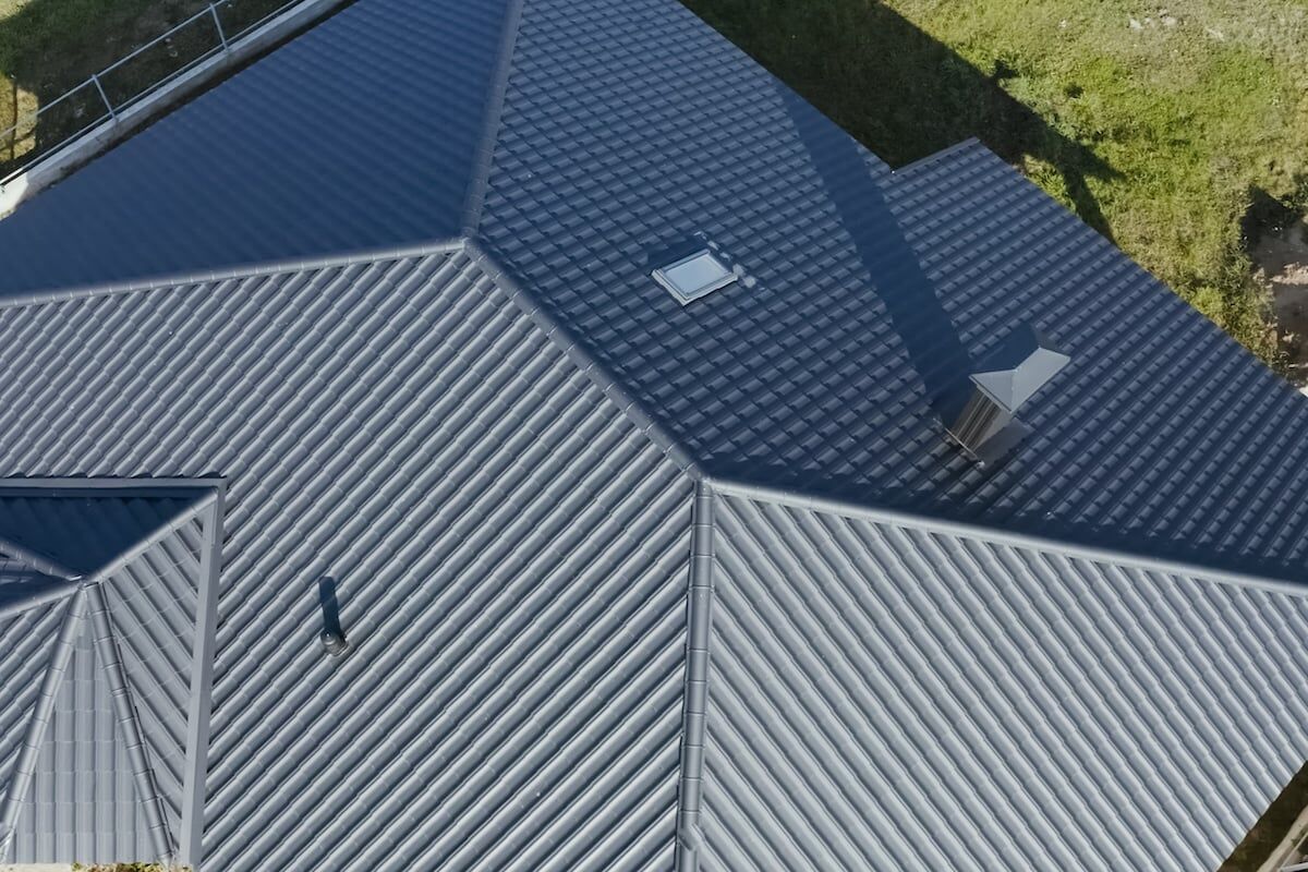 Modern roof made of metal. Corrugated metal roof and metal roofing.
