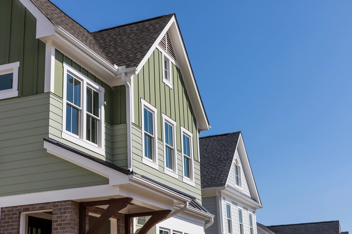 green siding on a house