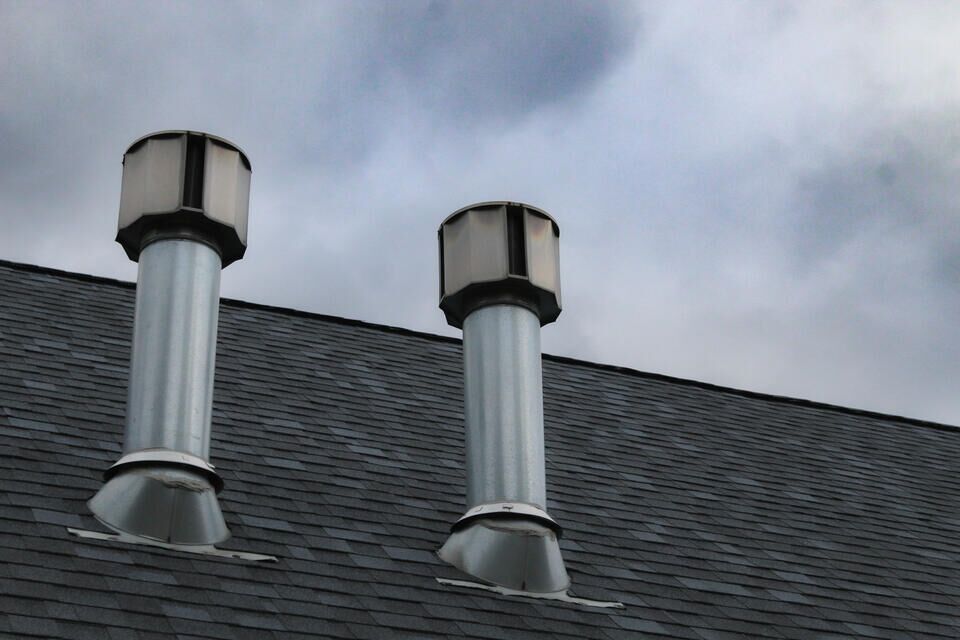 roof intake vents-pipe exhaust vents on shingle roof