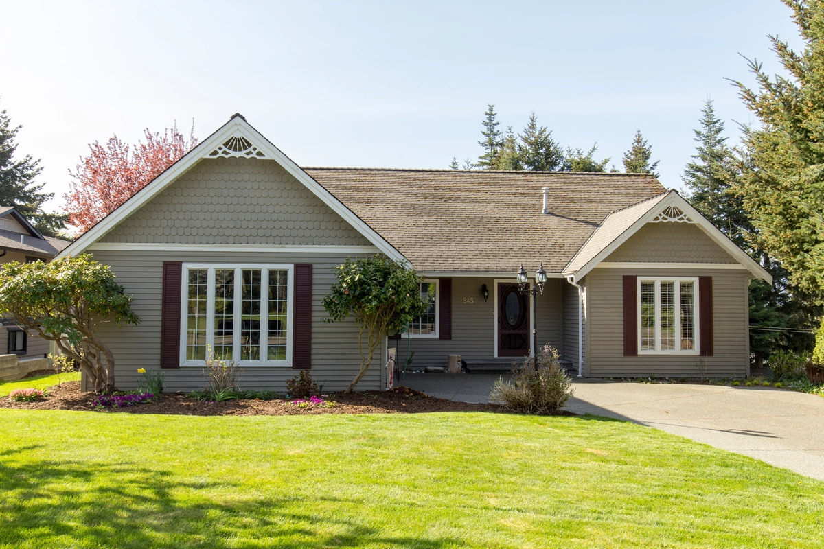 tan siding and brown shingles