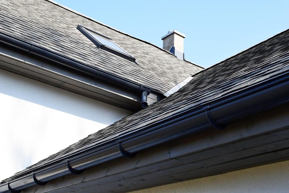 black streaks on roof-close up of roofing material on a house