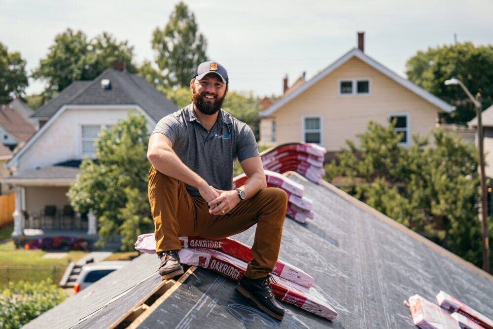 Indy roofing and restoration worker on roof in Whitefield Indiana