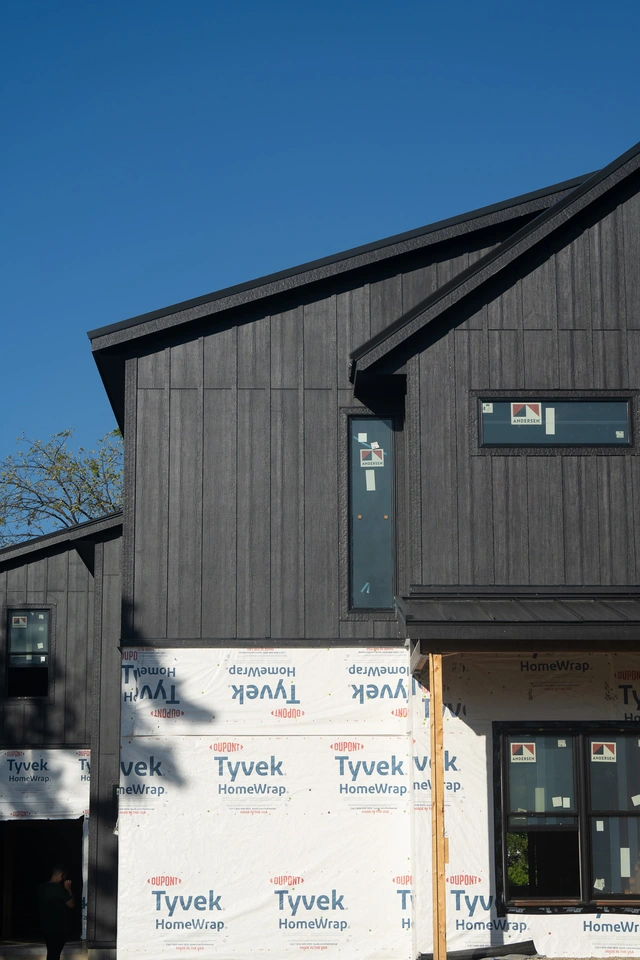 black house siding metal day