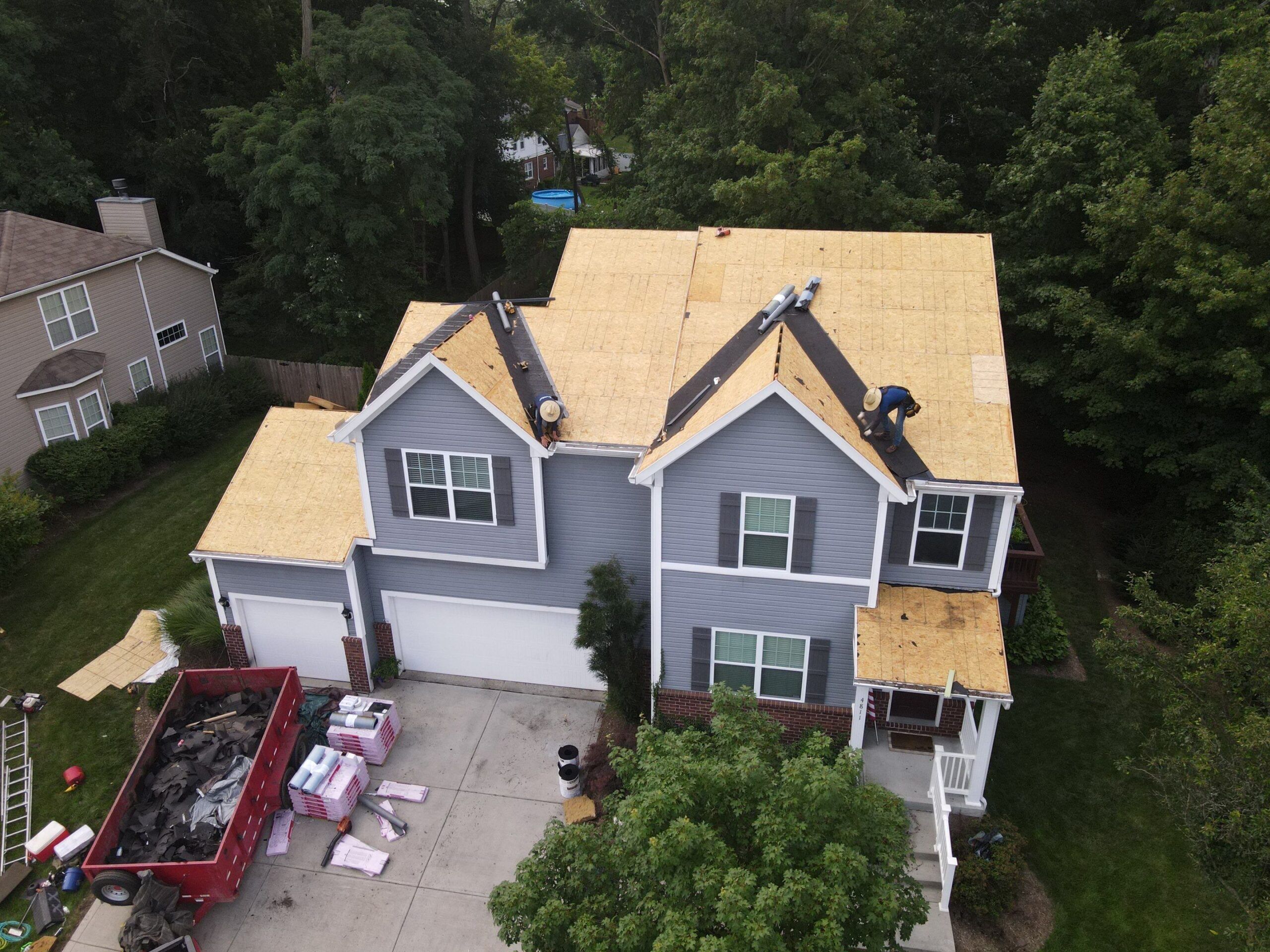 gray house and roof decking
