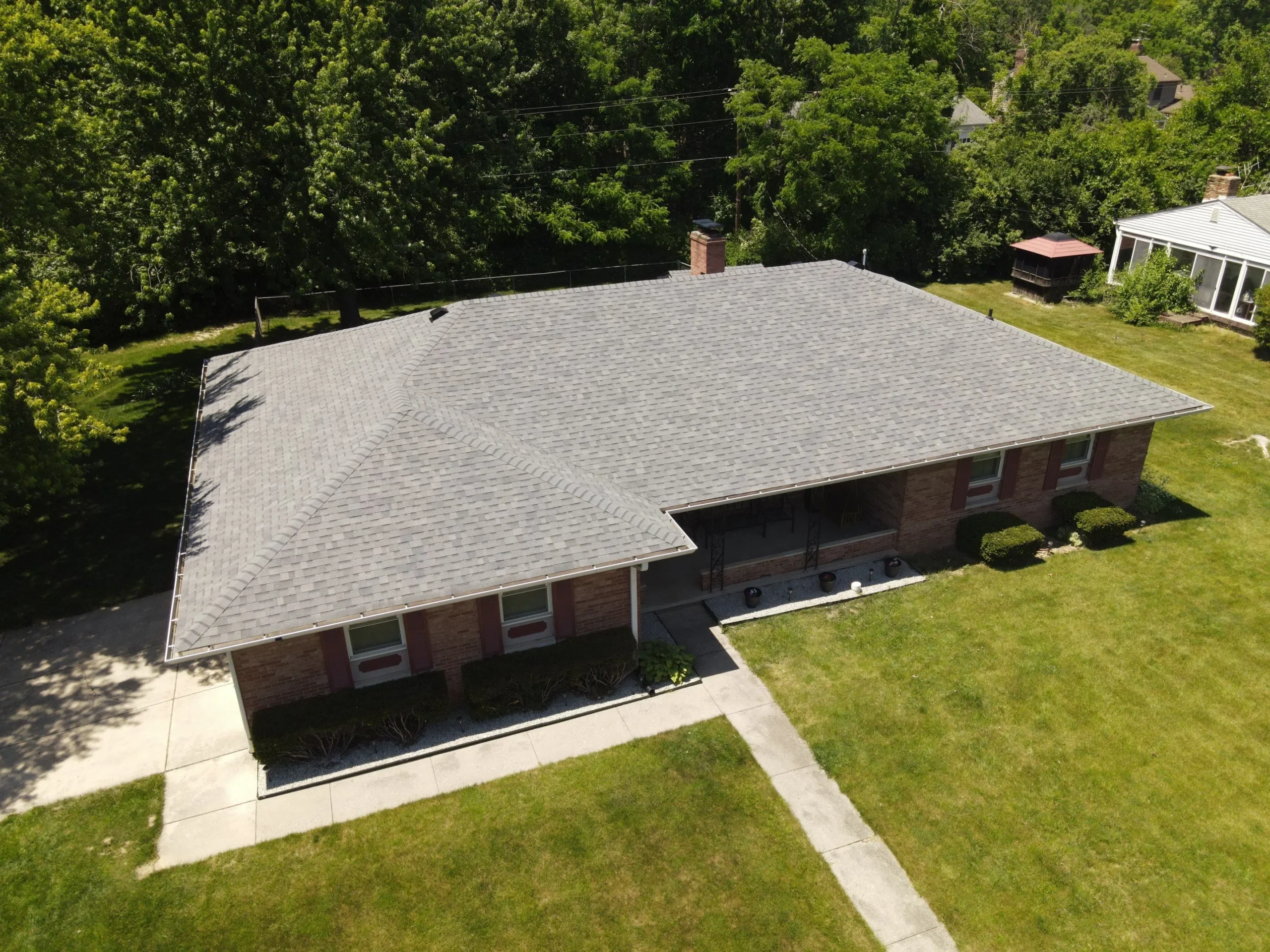 drone view of newly installed asphalt shingles