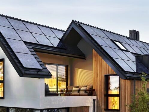 Solar panels on modern black medal roof