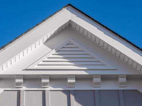 White soffit installed on suburban home