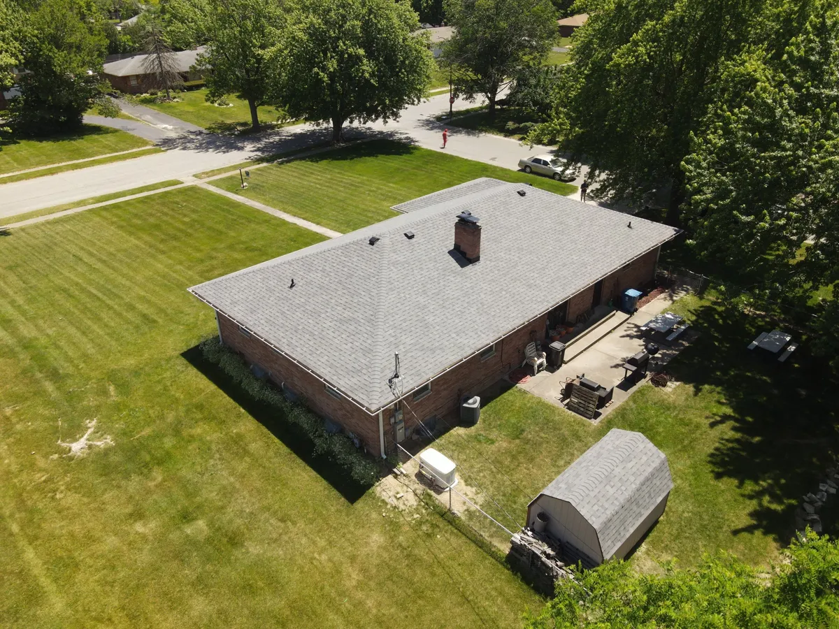 roof large shingle brick siding