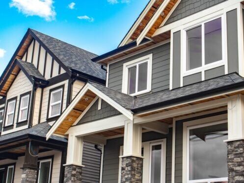 Newly build houses with differing versions of vinyl siding