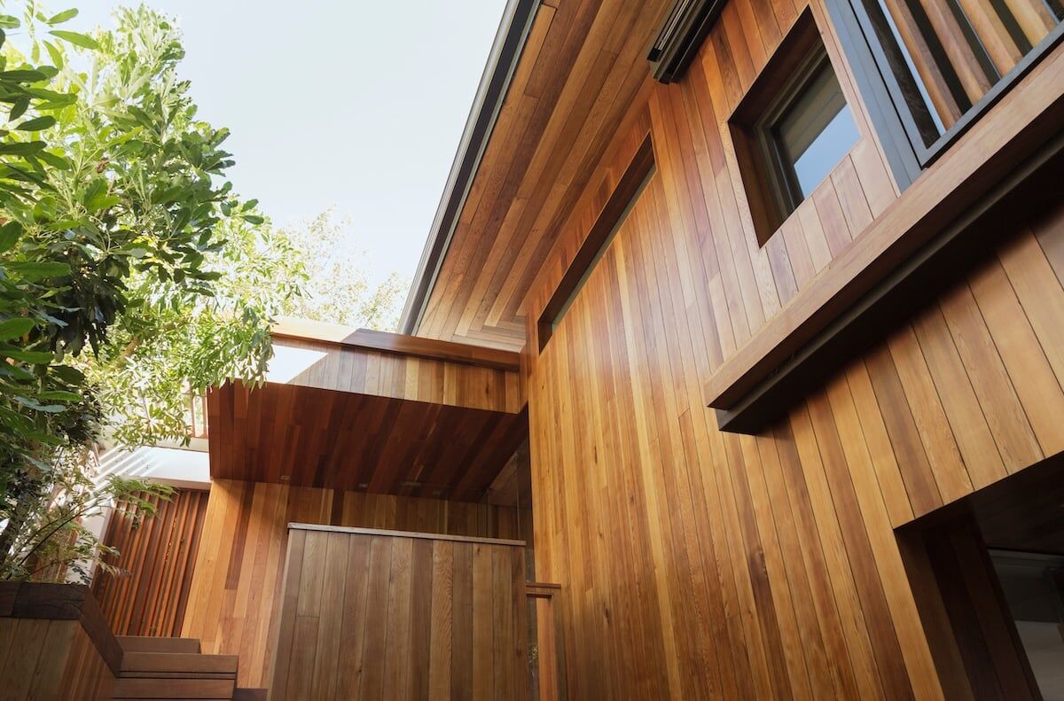 Wood siding on fancy large house