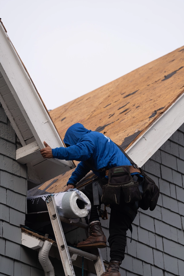 working on roof tear off